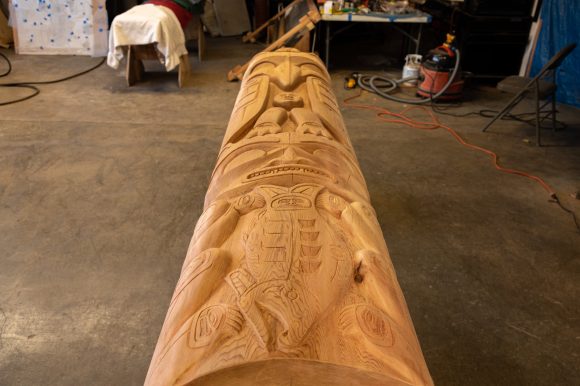 totem features eagle and many other animals
